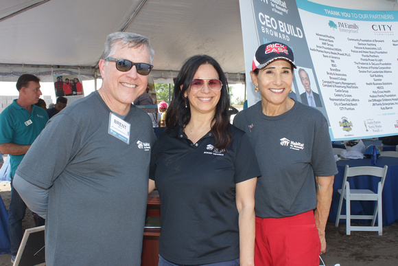 Brent Burns, president and CEO of JM Family Enterprises; Lily Pardo, Habitat for Humanity of Broward board member and director of public relations and community affairs at WSVN-TV; Rita Case, CEO of R