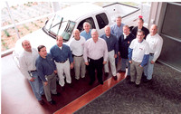 Southeast Toyota Distributors executives (left to right) Forrest Heathcott, Brent Burns, Taylor Ward, Bob Moore, Gary Thomas, Colin Brown, Tony Stromberg, Ed Sheehy, David Vincent, Scott Barrett, Mike
